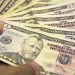 Dólar fecha praticamente estável após elevação de juros nos EUA